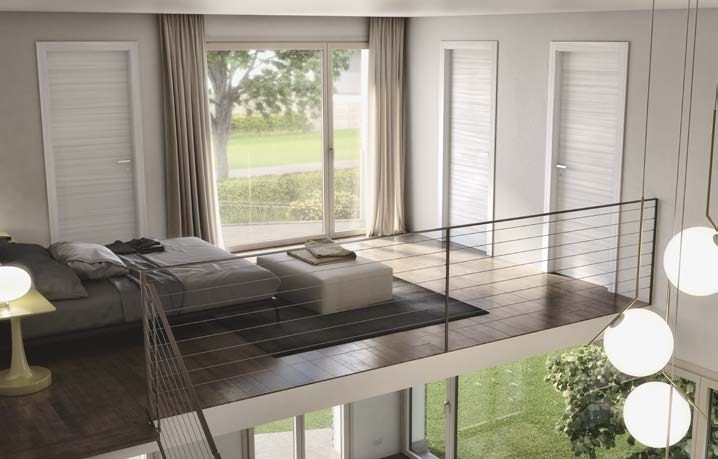 Chambre avec balustrade en verre